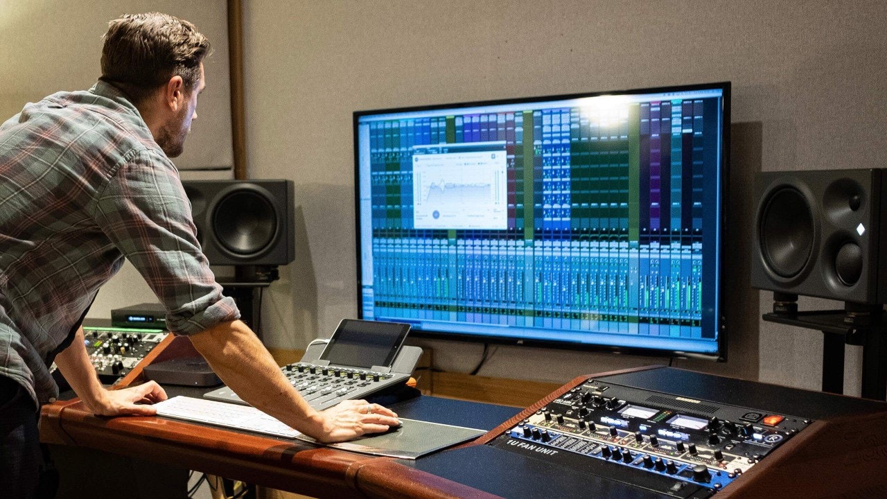 Music producer working in professional recording studio